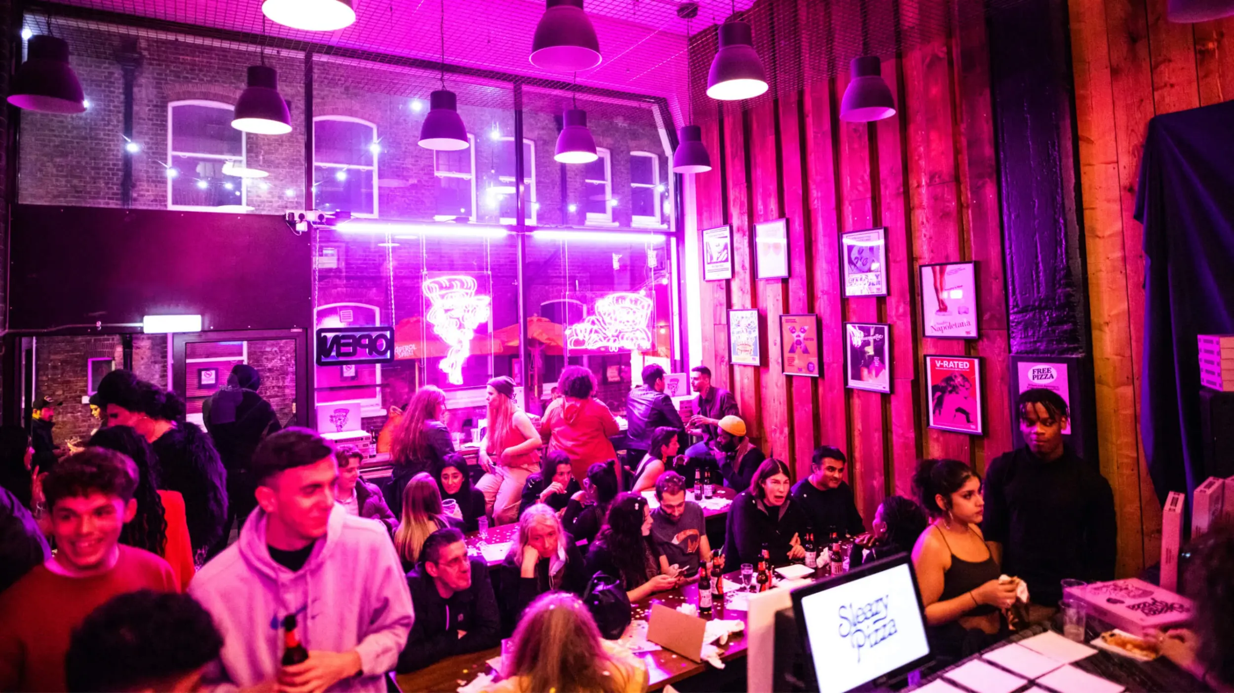 Neon signage design, logo design and brand identity design for Sleazy Pizza restaurant in East London