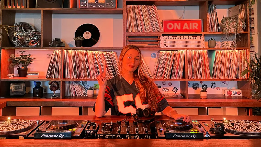 Cafe 1001 custom vinyl DJ booth and rotary mixer