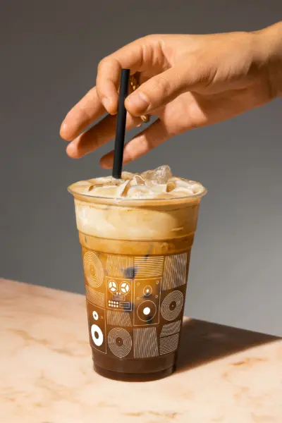 cafe 1001 custom iced coffee takeaway cup brand identity design